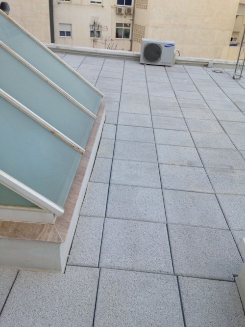 Aislamiento térmico en cubierta y medianería en calle Sicardo (Almería)