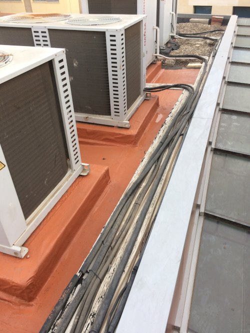 Reparaciones en cubierta del Colegio Oficial de Aparejadores y  Arquitectos Técnicos de Almería